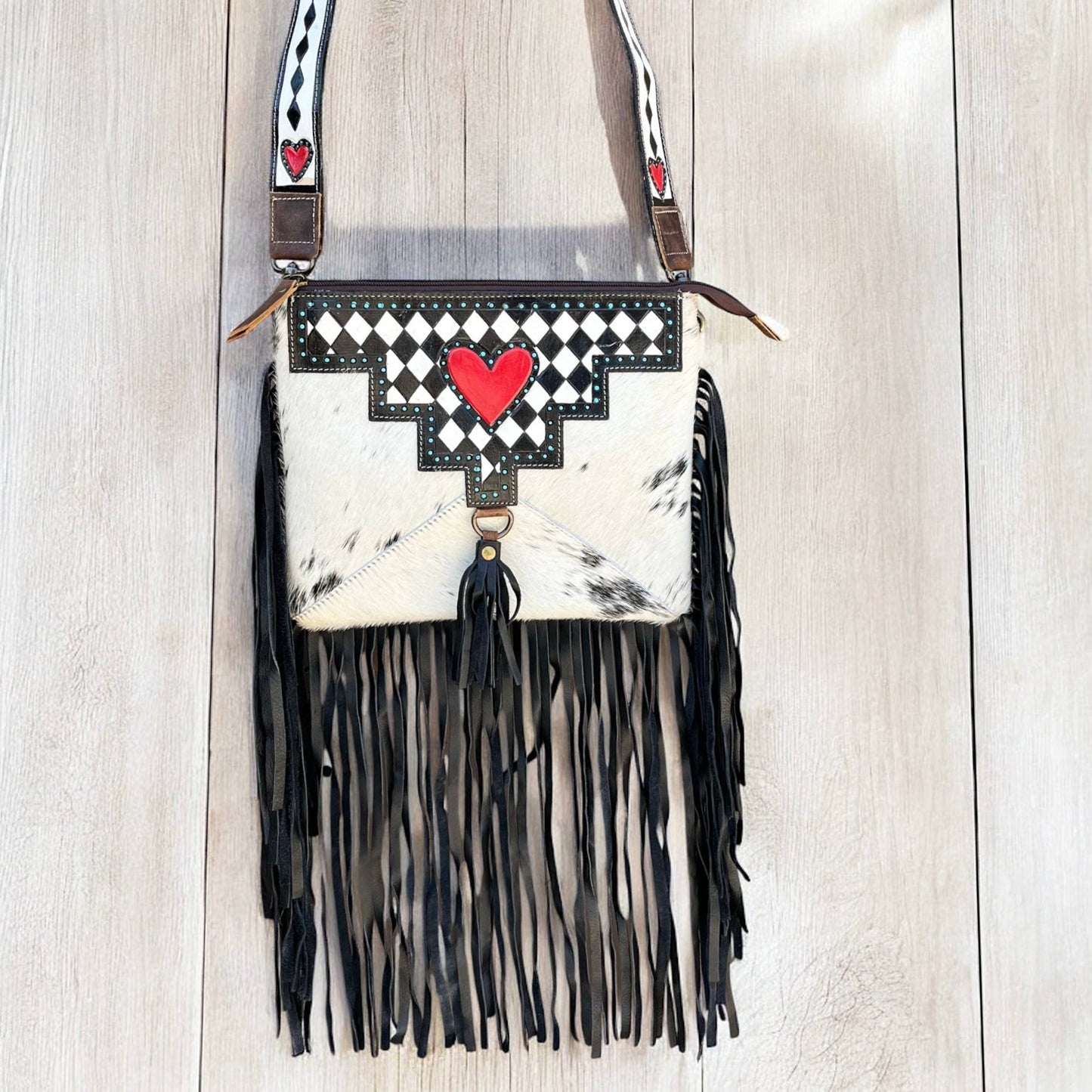 Heart checker tooled leather & cowhide fringe crossbody